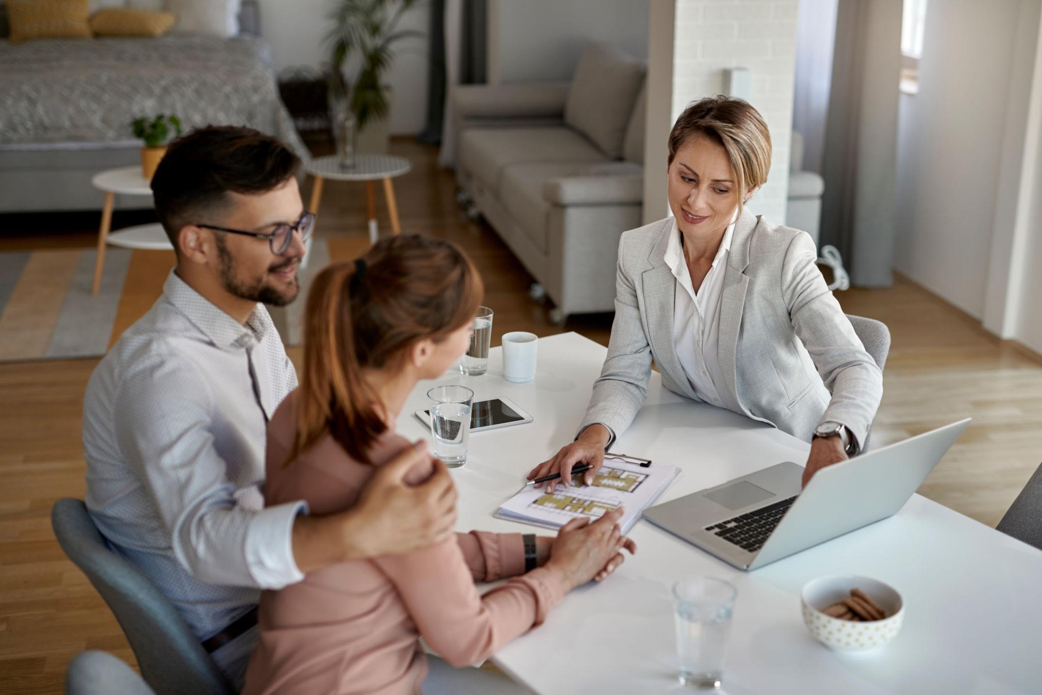 Real estate professionals networking at a conference